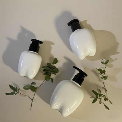 ขวดพลาสติกรูปฟันขนาด 100-250 มล. พร้อมปั๊มกดสำหรับล้างมือ โลชั่นบำรุงผม เจลล้างมือ สามารถปรับแต่งโลโก้ได้